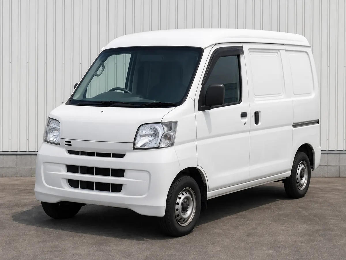 2017 Daihatsu Hijet Cargo S321V refrigerated kei van front three-quarter studio reference