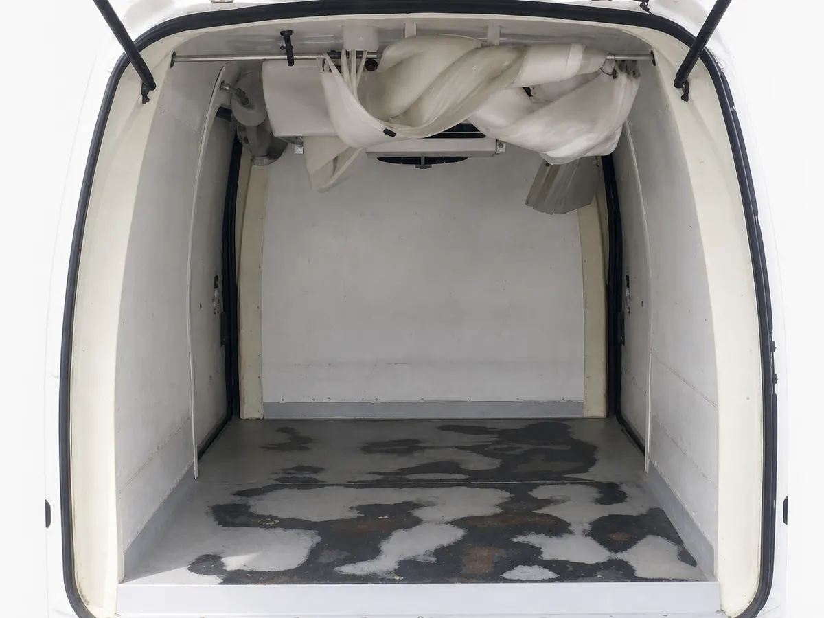 Refrigerated interior of 2017 Daihatsu Hijet Cargo S321V with overhead evaporator