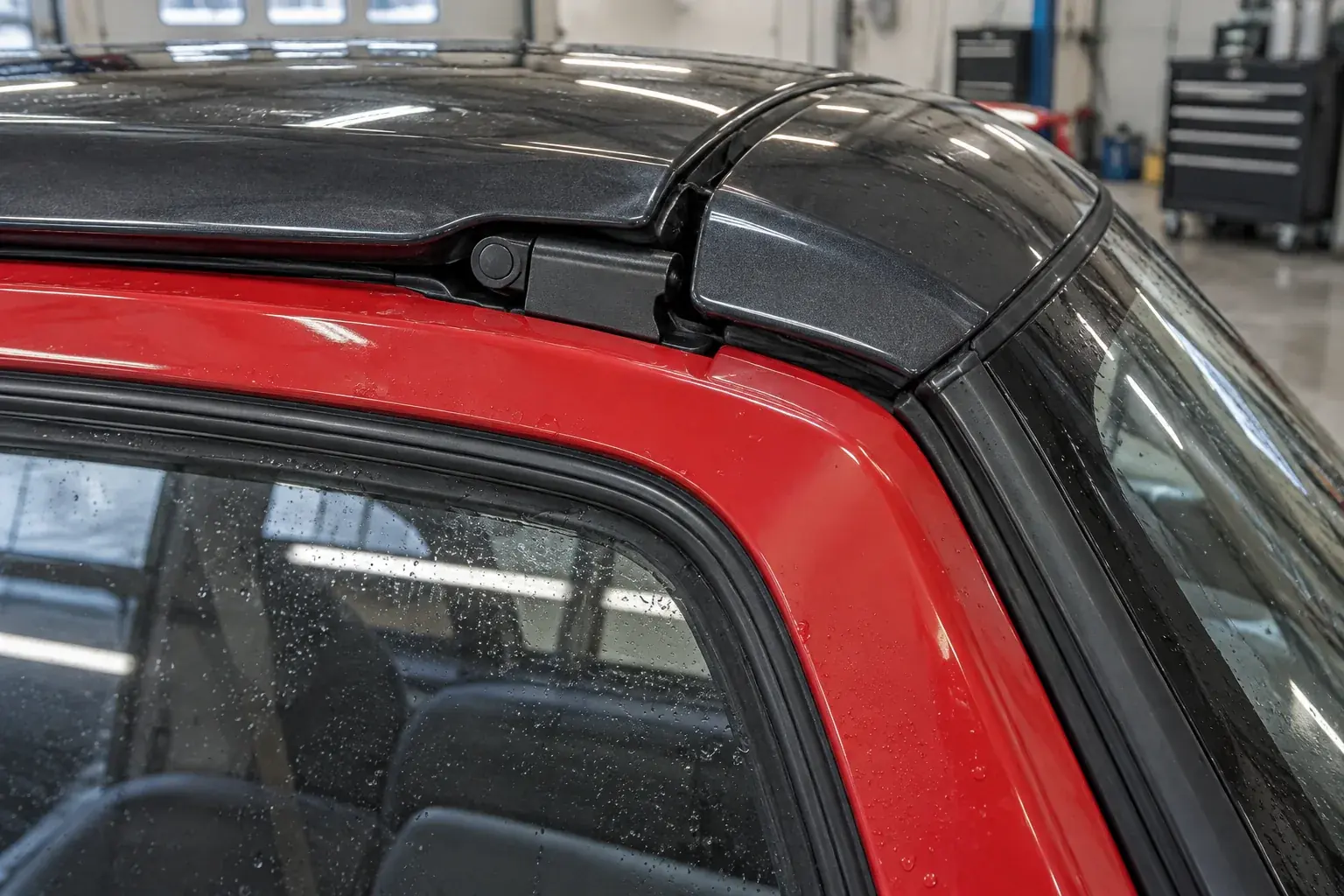 Gullwing-door roof hinge, weatherstrip and seal inspection detail on a kei coupe