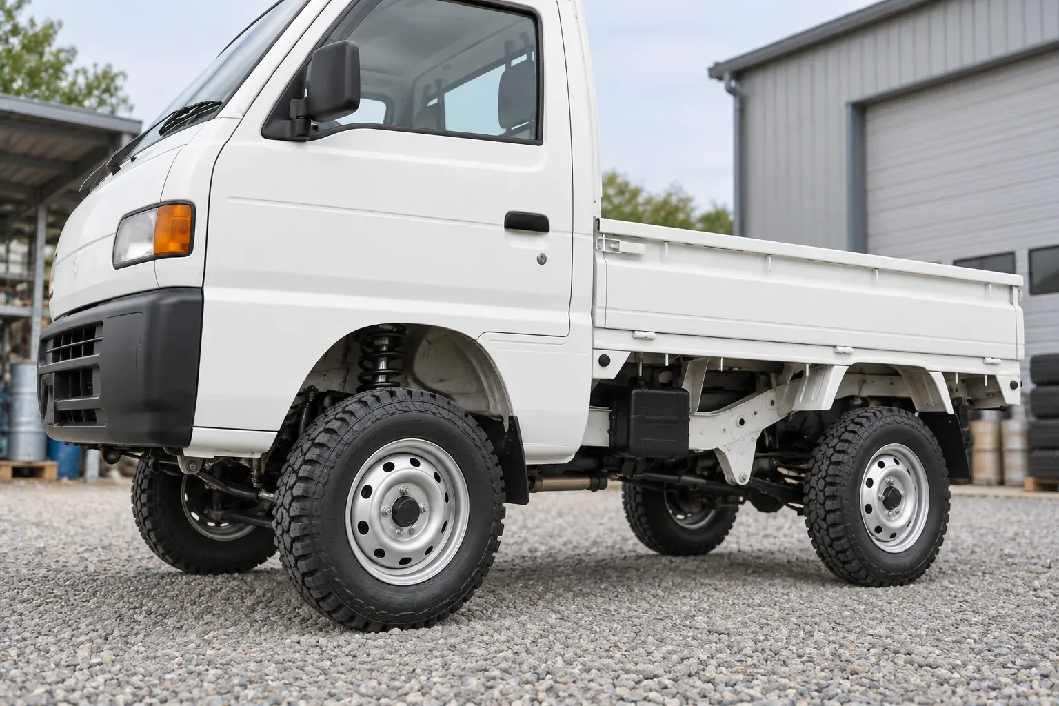 Japanese kei pickup with documented lift and tire fitment lift kit and tire-fitment inspection