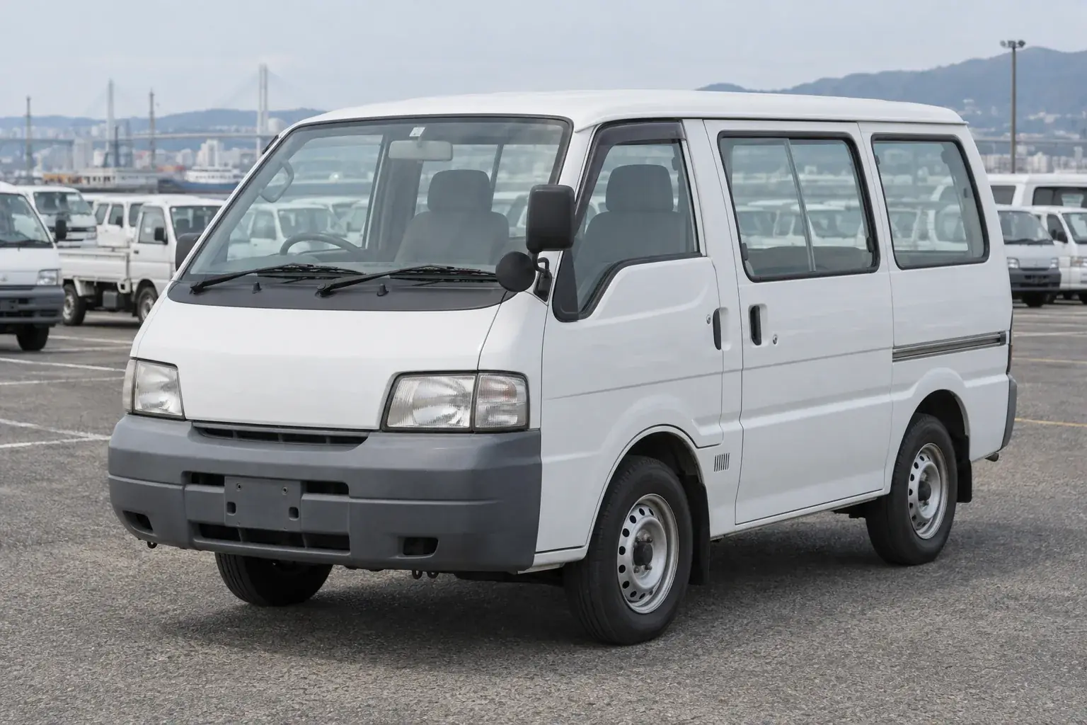 White Mazda Bongo SK van, front three-quarter view illustration