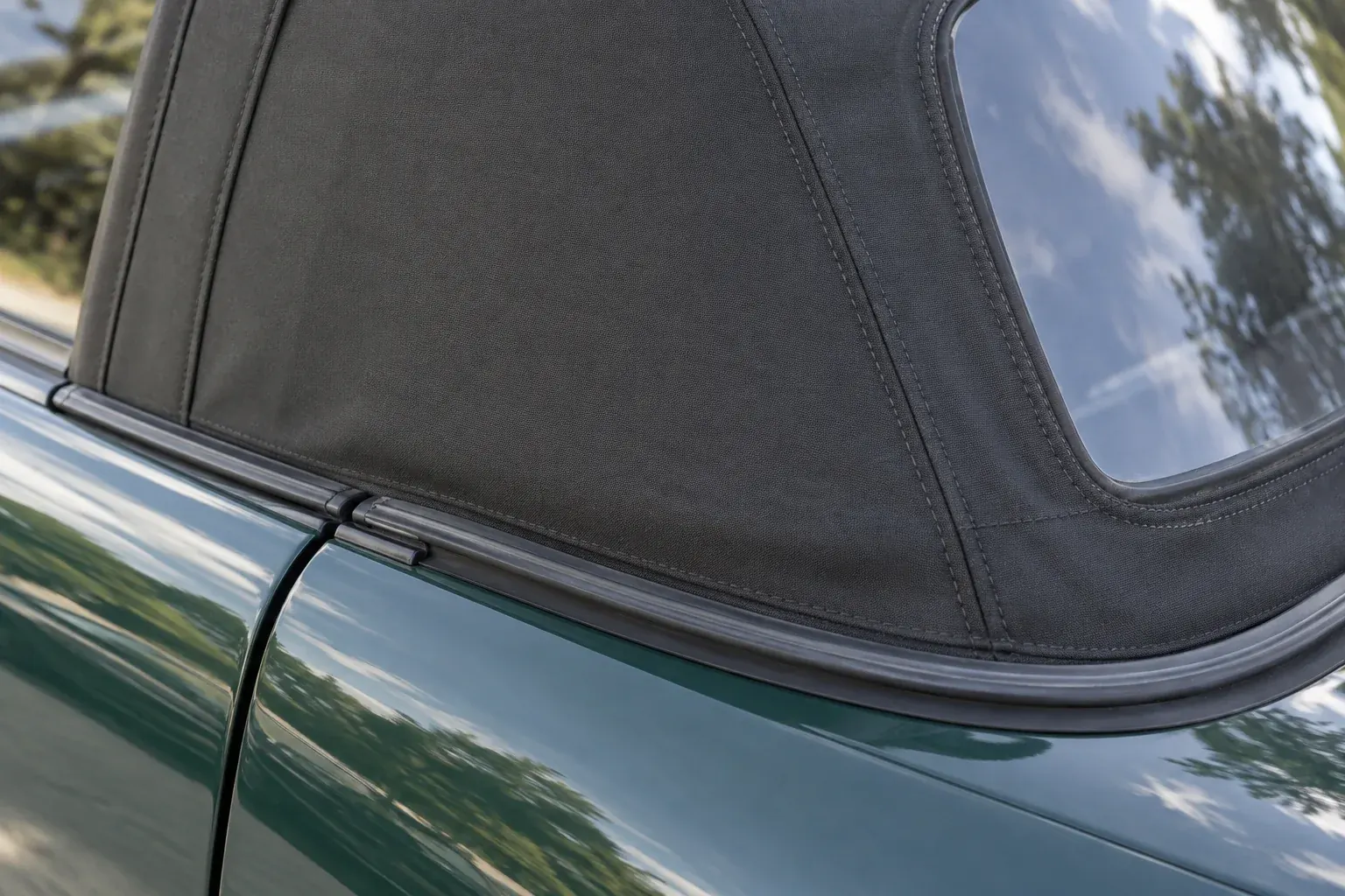 Soft-top edge, rain rail and body seal to check for water entry on a Honda S2000