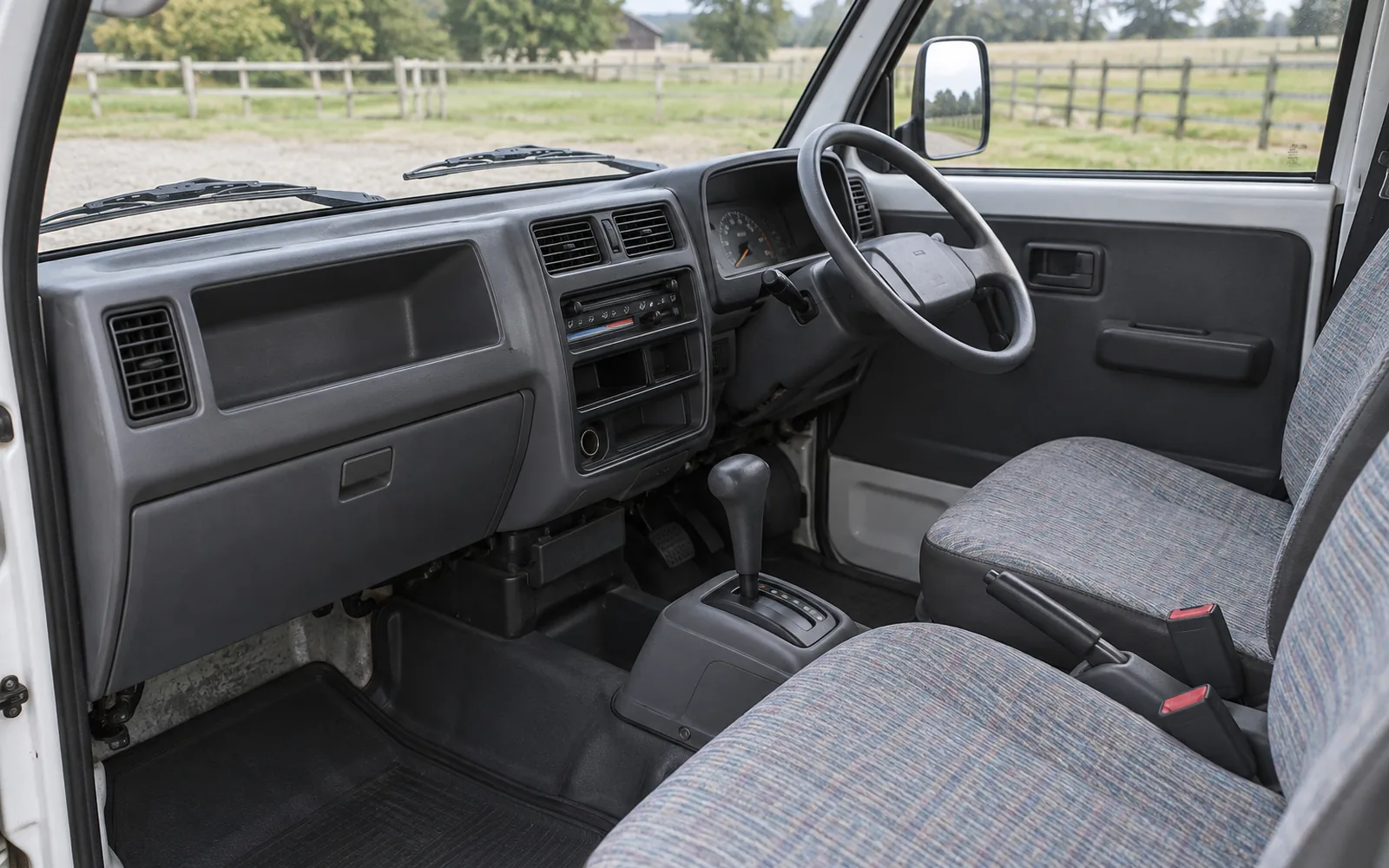 Automatic kei truck right-hand-drive interior with a floor selector