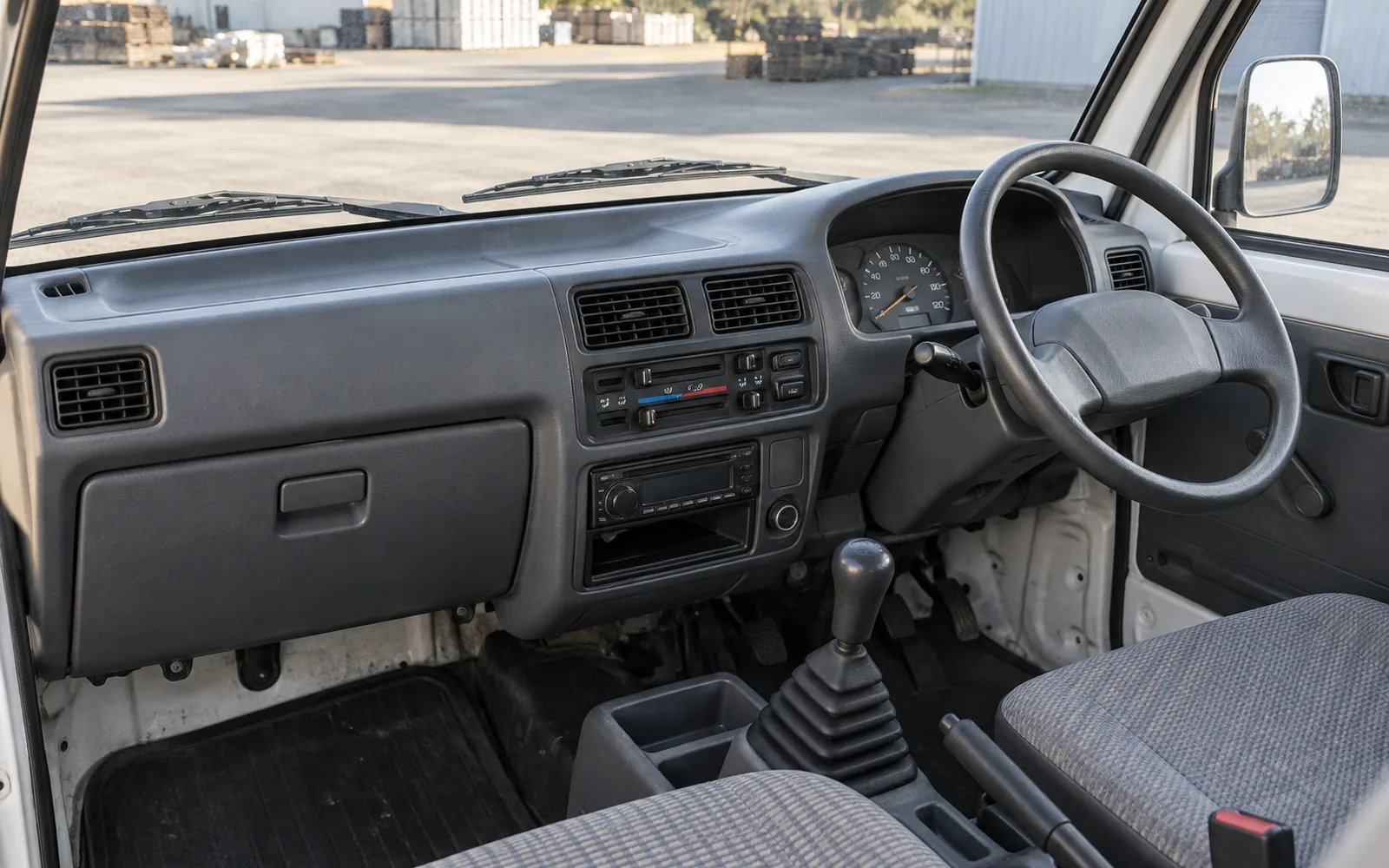 Do kei trucks have AC? A period right-hand-drive dashboard with heater controls